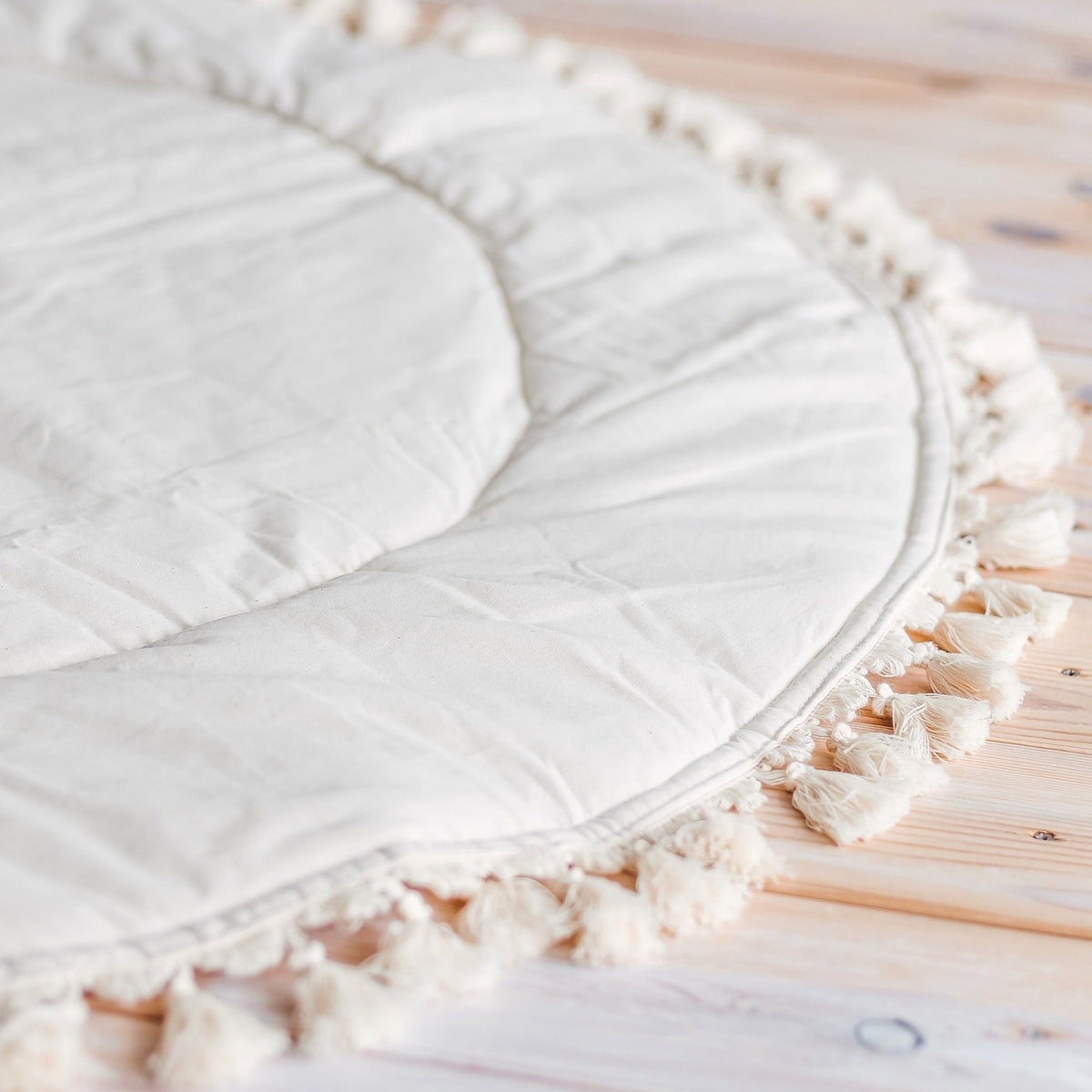Rond speelkleed ecru met kwastjes – afbeelding 7