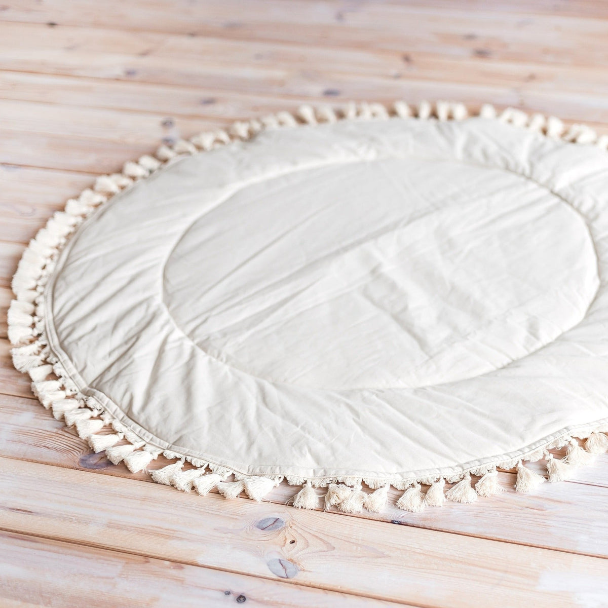 Rond speelkleed ecru met kwastjes – afbeelding 8
